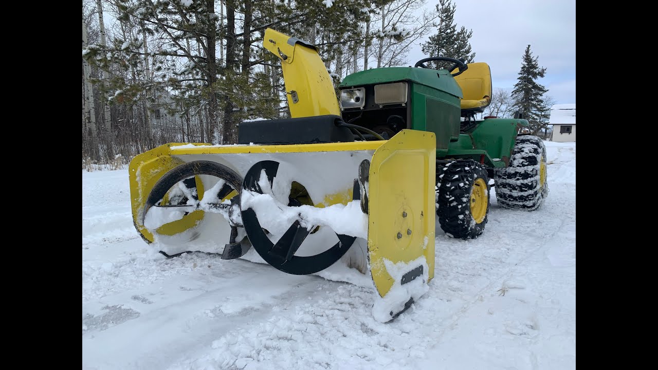 Snowblowing with JD 455 Diesel Power!