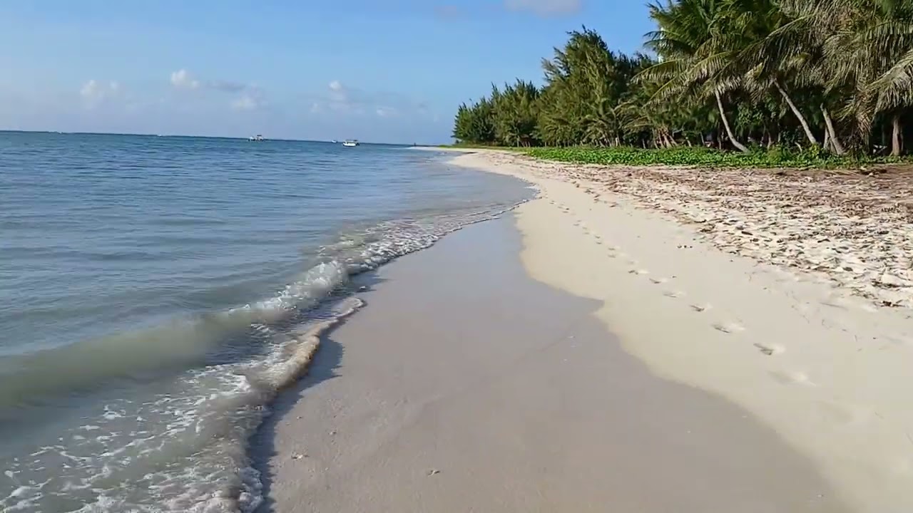 Enjoy walking at the white sand beach here in Garapan Saipan