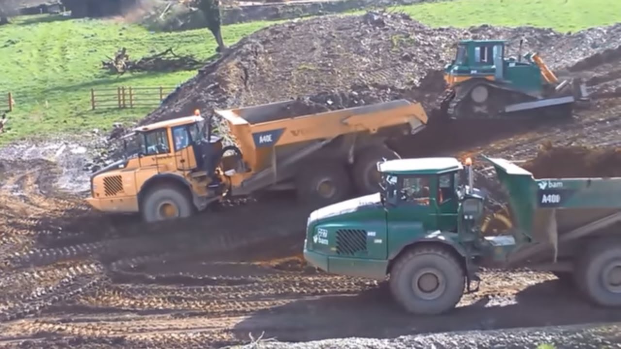 Construction equipment - CAT D6 dozer at work pushing dirt