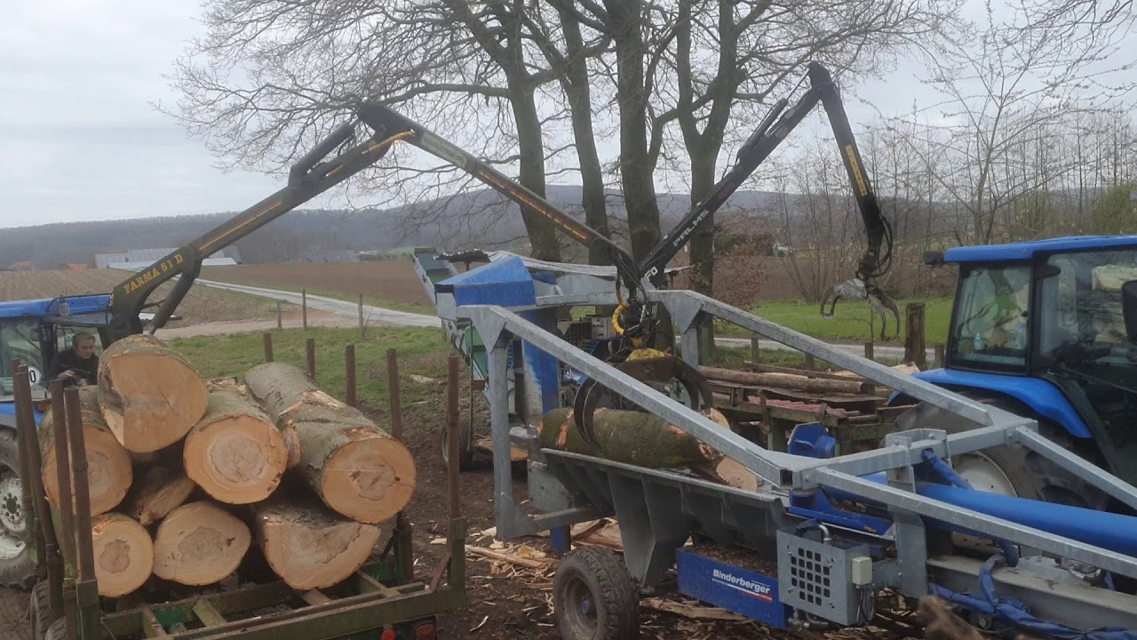 Starkholz spalten mit New Holland und Binderberger