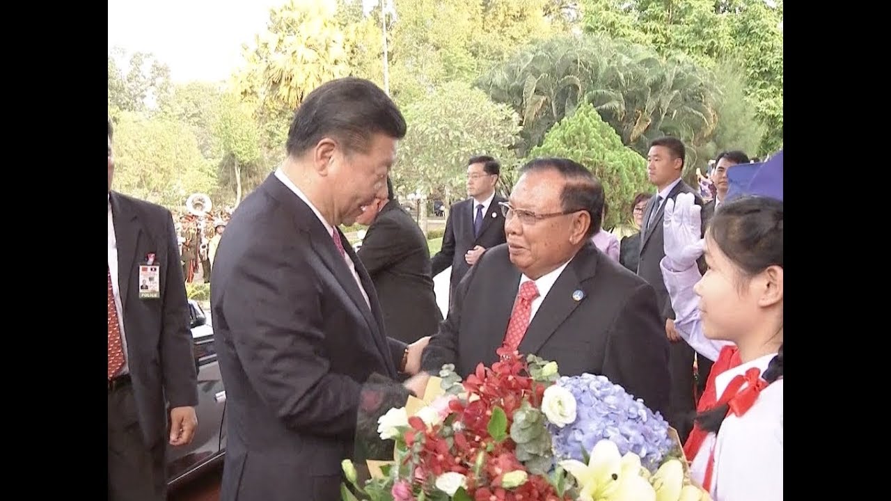 President of Laos Holds Welcome Ceremony for Visiting Chinese President Xi Jinping