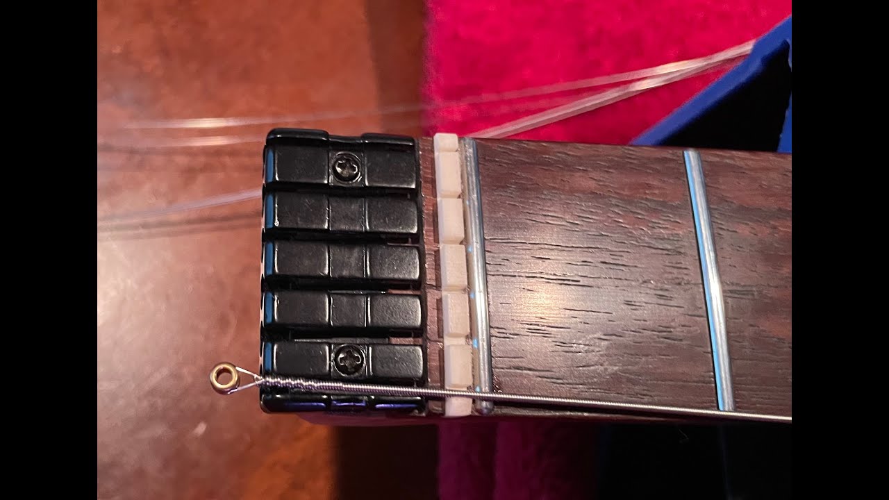 Eart W2 Guitar Restringing