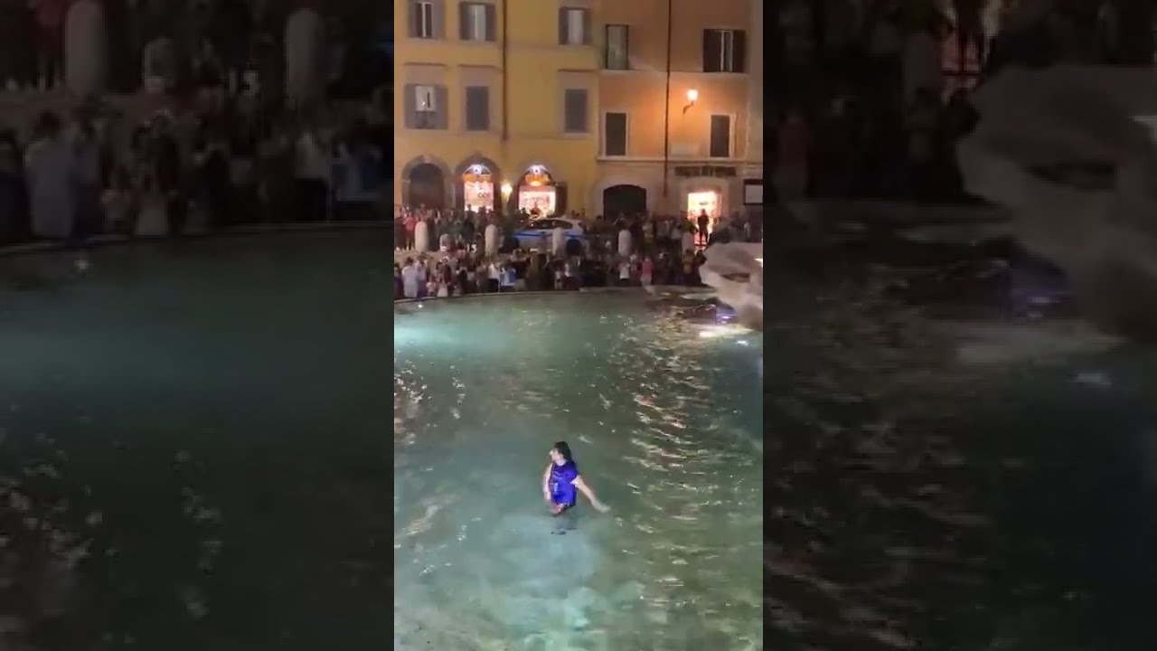 Swimming in the Trevi Fountain in Rome || ViralHog