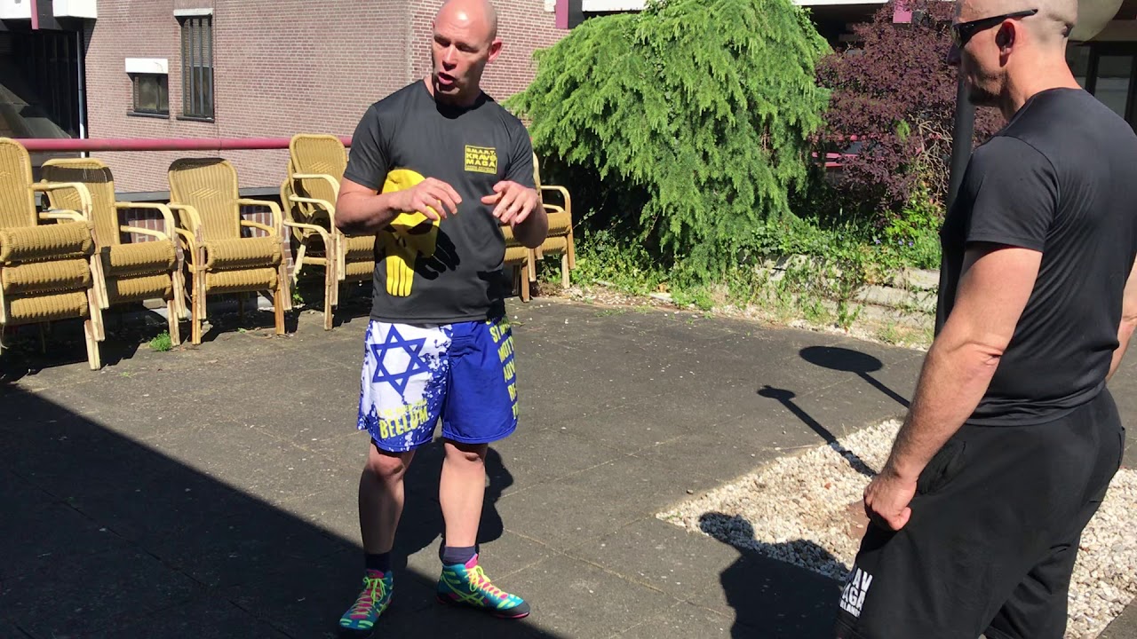 Scooping Defense vs Kick, with Amnon Darsa at Expert Camp, Institute Krav Maga Netherlands.