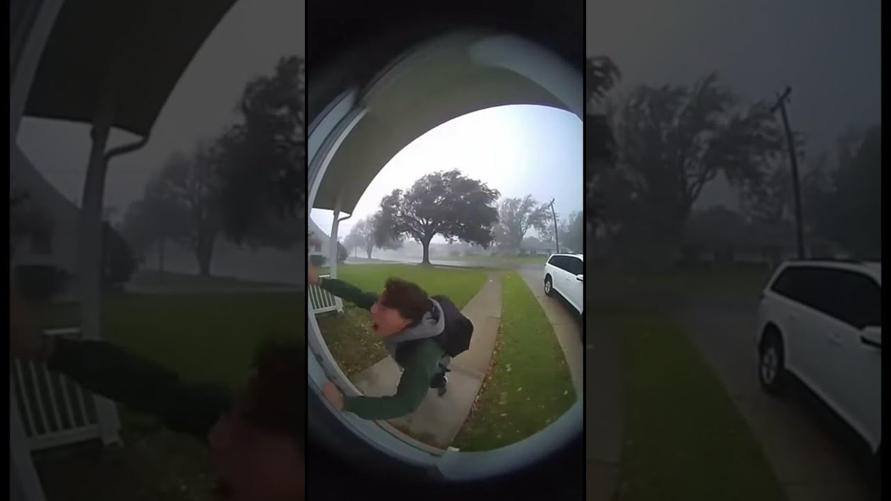 Teenage boy can't make in his house because of strong wind!