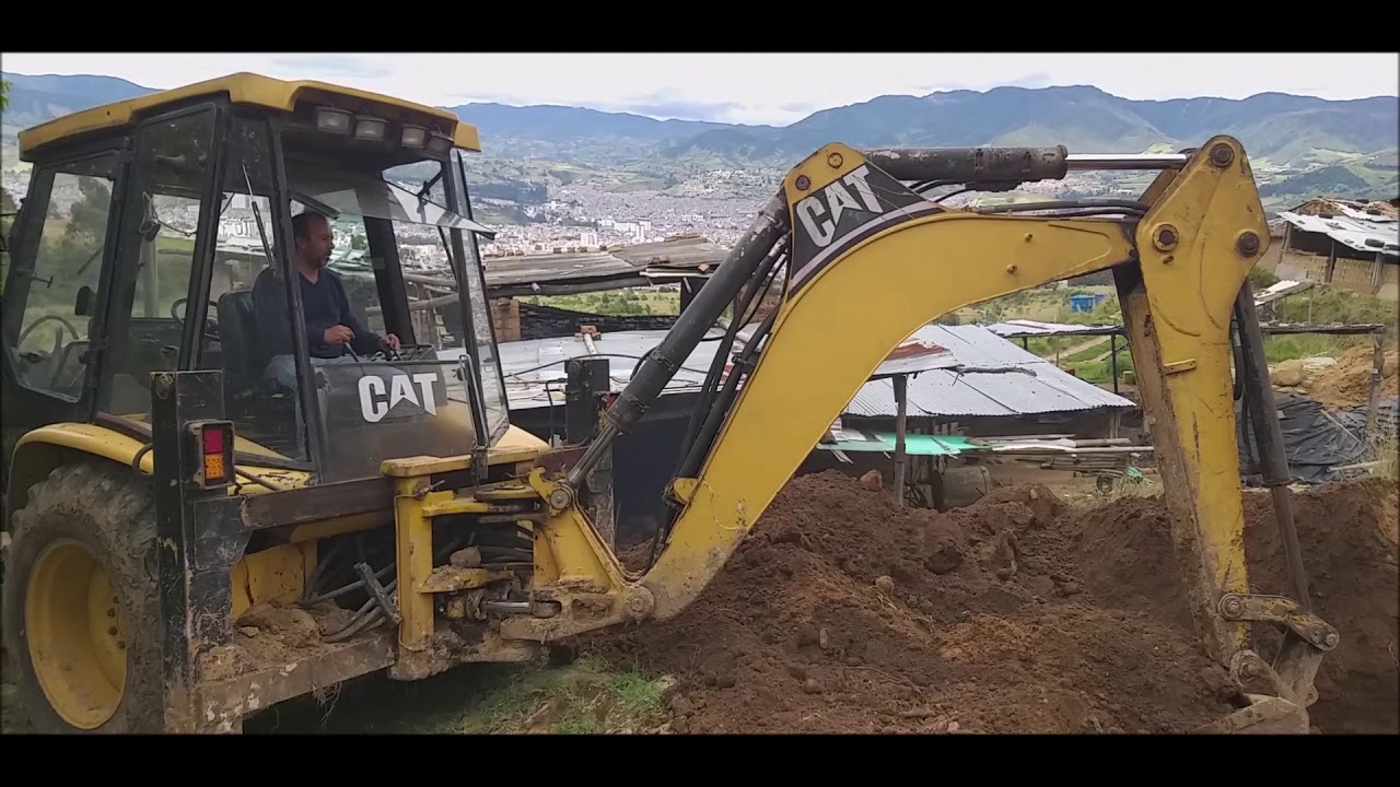¿COMO SE OPERA UN RETROCARGADOR CATERPILLAR 428C? (TUTORIAL)