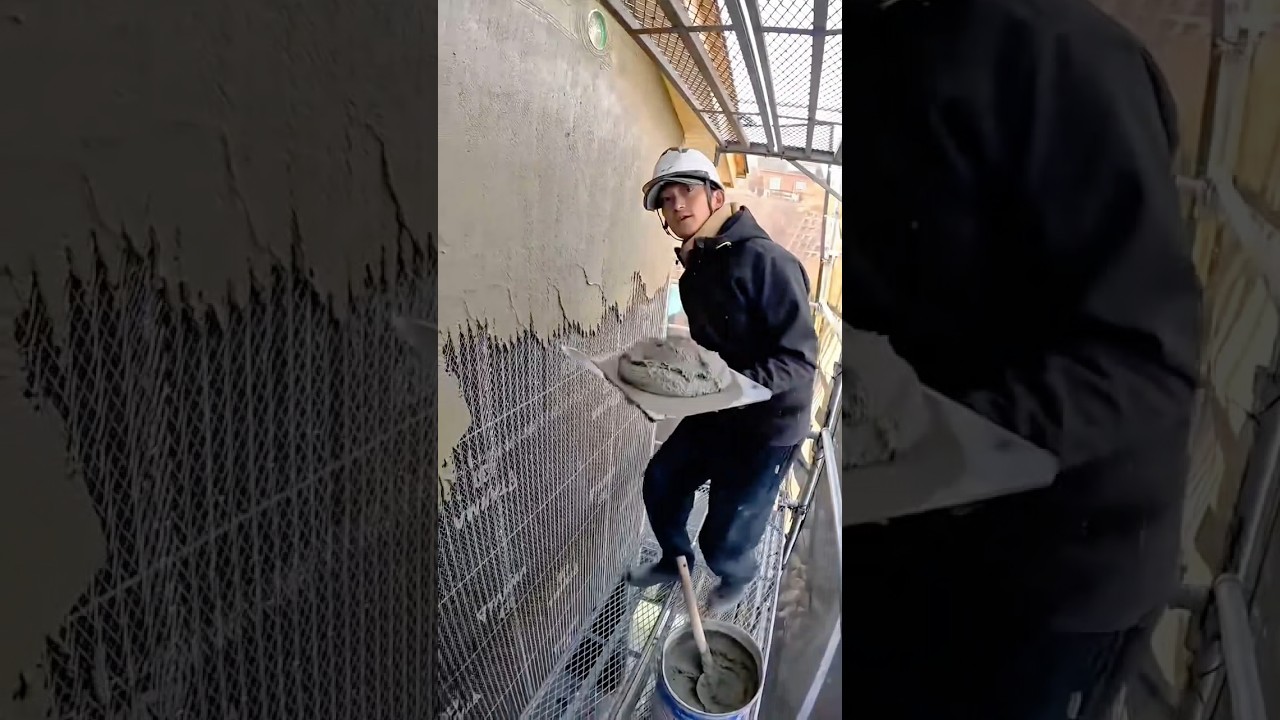 Applying Cement Plaster Over Wire Mesh on a Building Wall