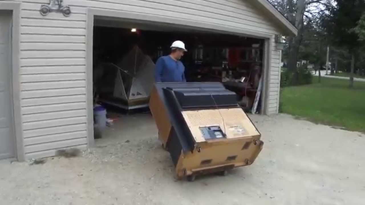 Greg Zanis - Scraping Apart A Big Projection TV