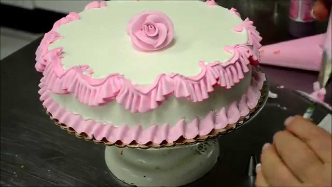 Chef Making a Pink Birthday Cake in Bakery