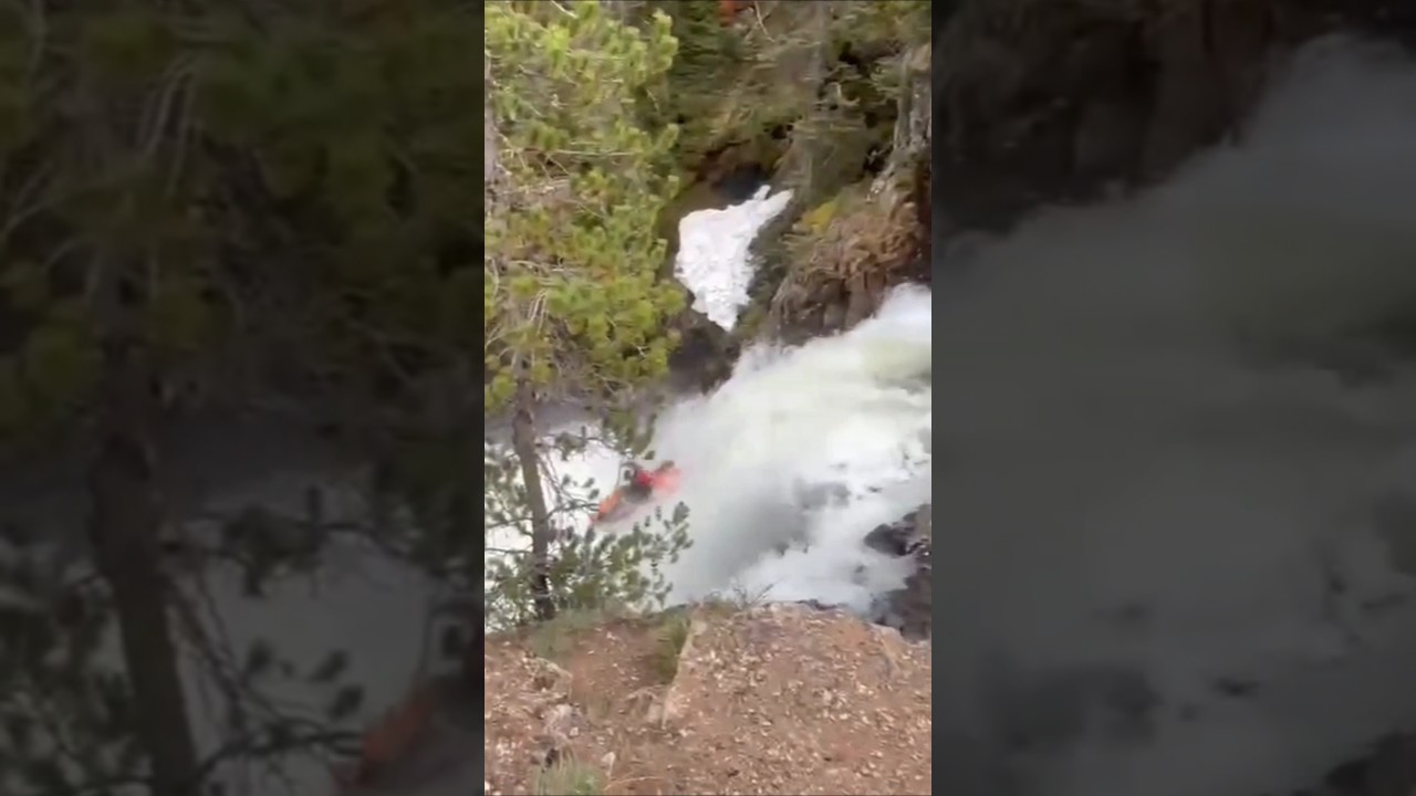 extreme kayaking down the waterfall