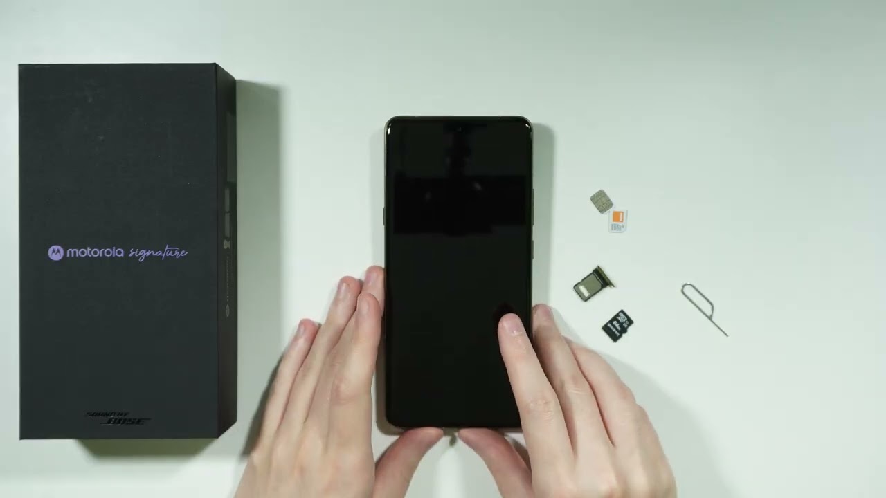 Motorola Signature: Как открыть слот для SIM-карты (извлечь лоток для SIM-карты)