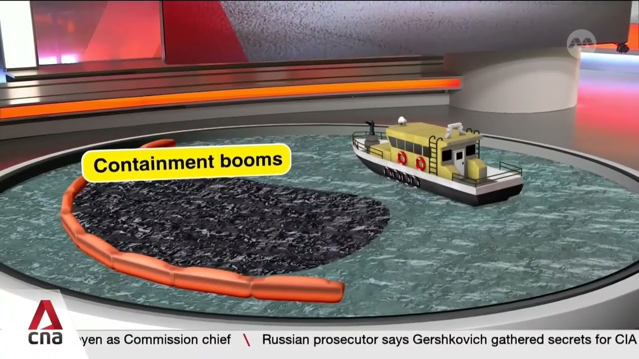 How is Singapore cleaning up the oil spill along its southern coast?