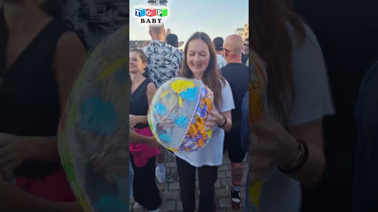 Inflating a Beach Ball for Carl Cox concert near Historical Cranes in Antwerpen.