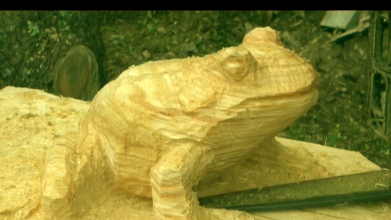 Woodcarving a bull frog