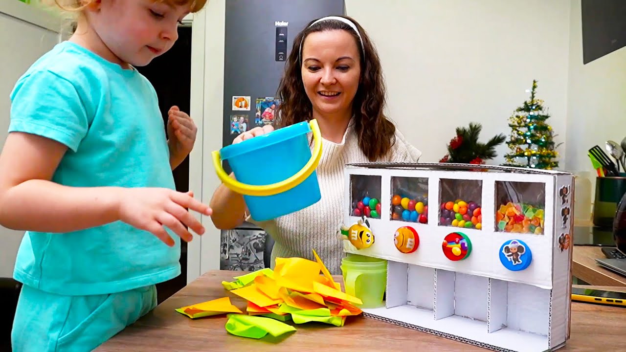 Juliana learns good behavior with the help of a candy machine!