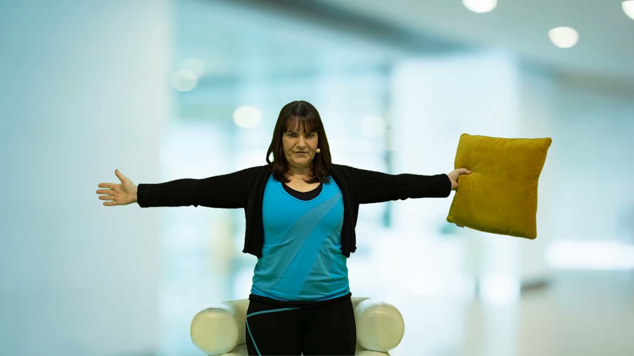 Josefa Domingos leads a 10-minute dual task exercise class