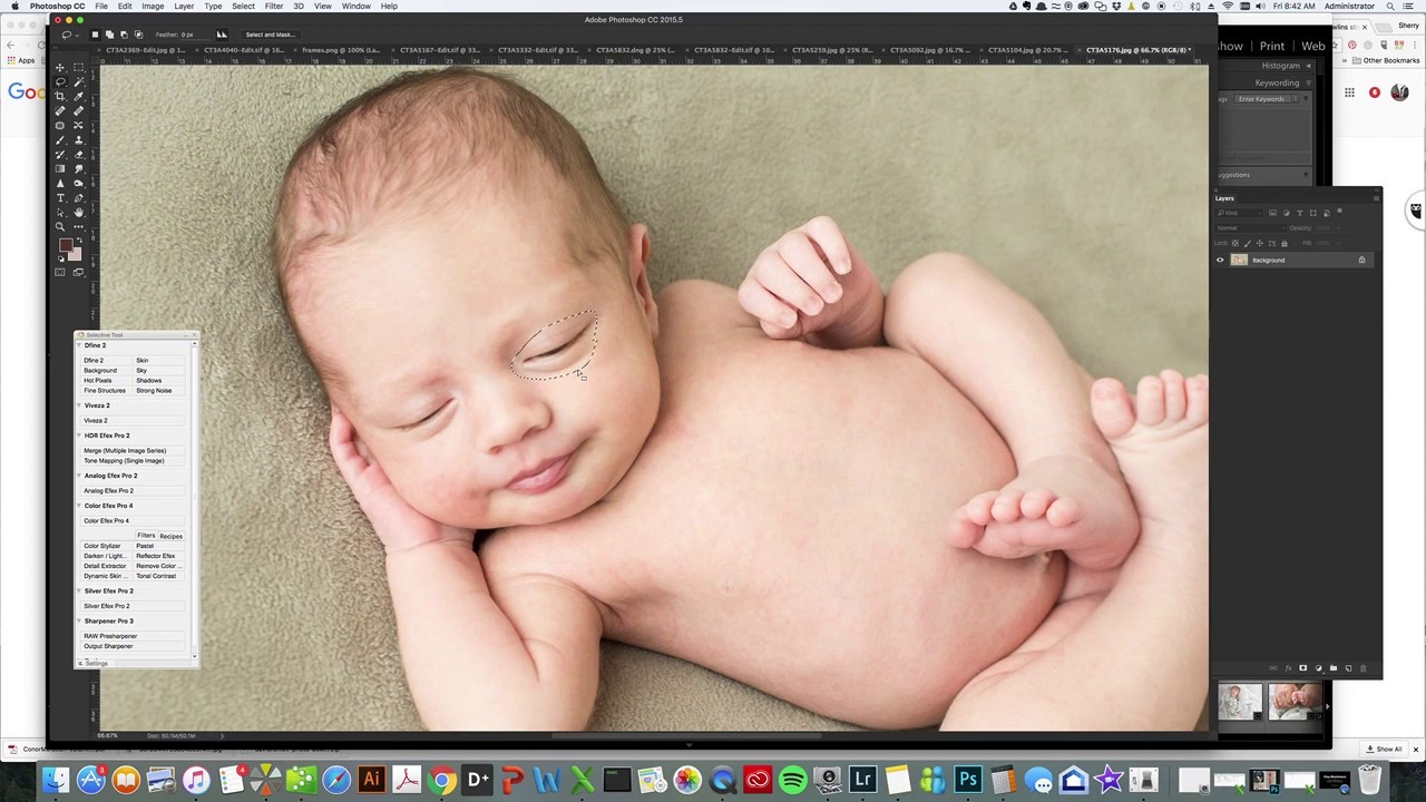 Close eyes on a newborn in photoshop
