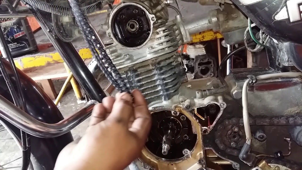 como cambiar la cadenilla   y  coger el tiempo      boxer ct 100