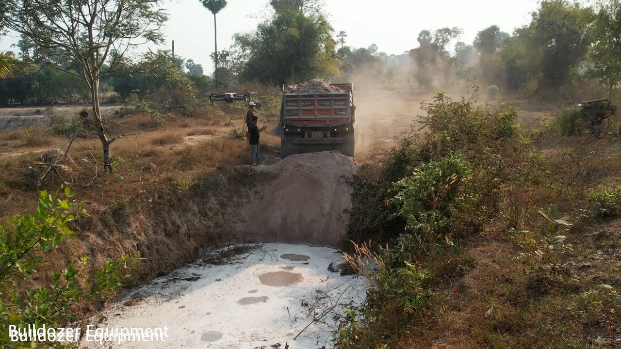 Crocodile pond project with 100% water, size 6 meters By 12 meters By Dump mTruck 5T & BULLDOZER