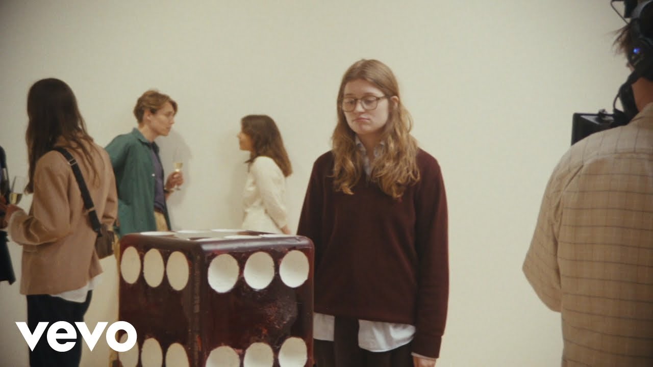 girl in red - The exhibition shoot (Marie goes Wes Anderson)