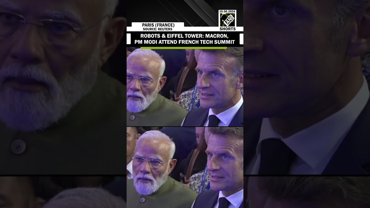 Macron and Modi visit Paris tech conference featuring robots and Eiffel Tower model