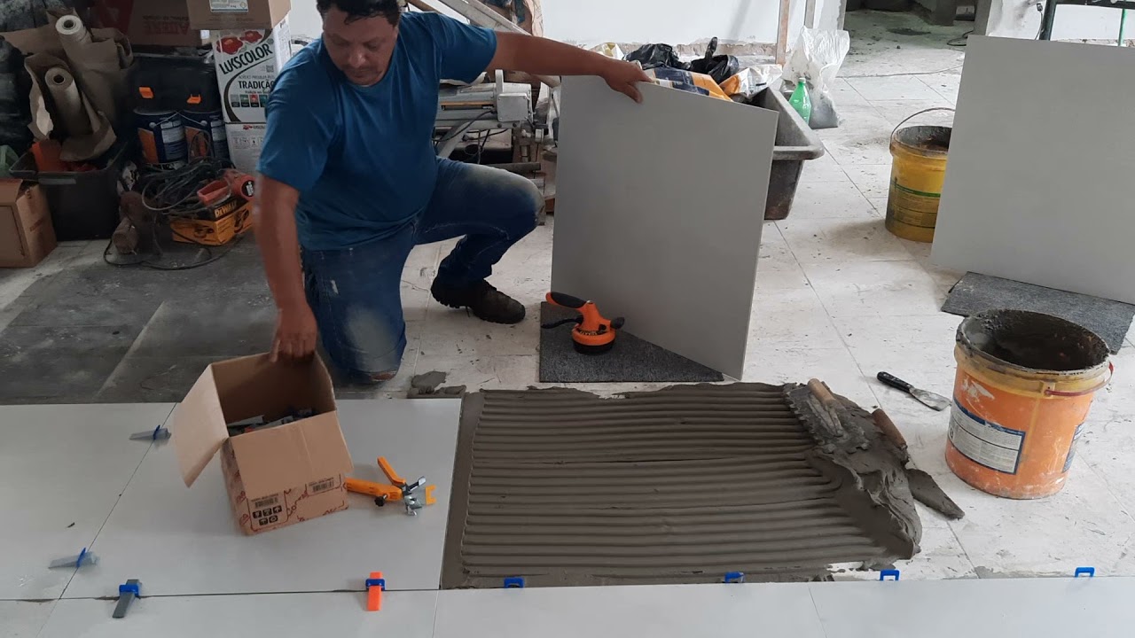 como assentar porcelanato com maquina vibratória.