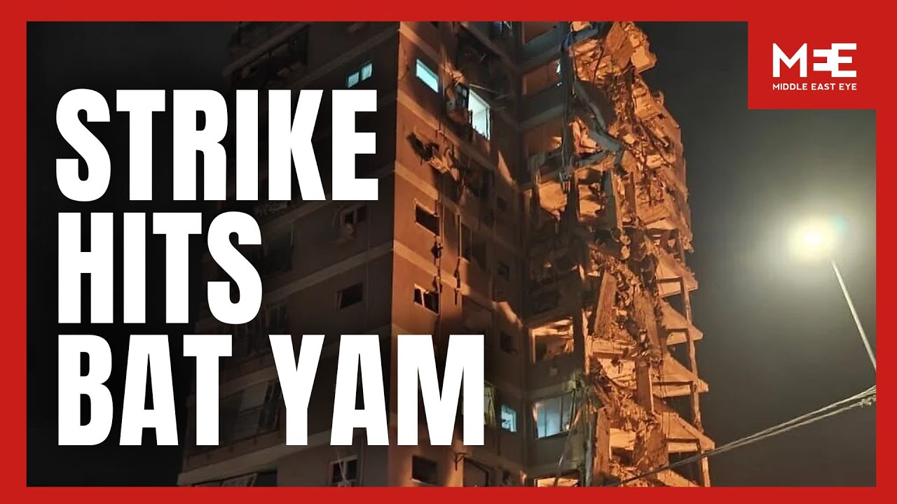 Emergency crews respond to missile strike in Bat Yam