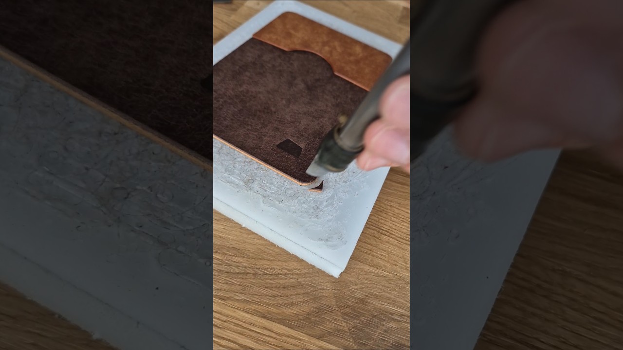 Punching round corners of a handmade leather bi-fold wallet #leathercraft #asmr