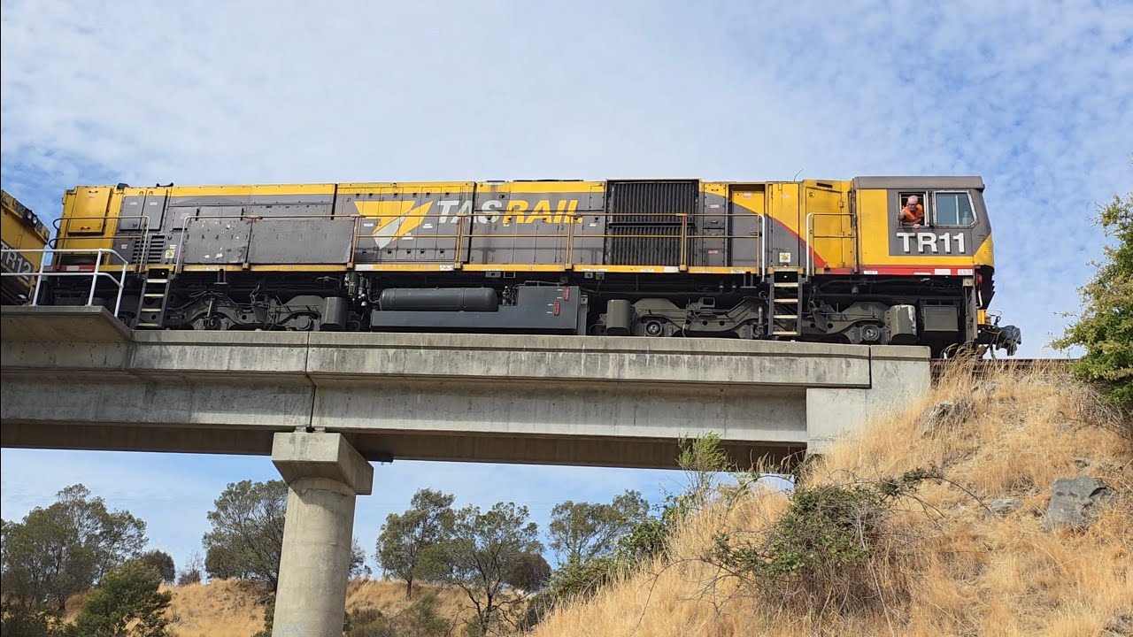 TasRail TR11 TR12 #33 train passing over Remount Road Bridge