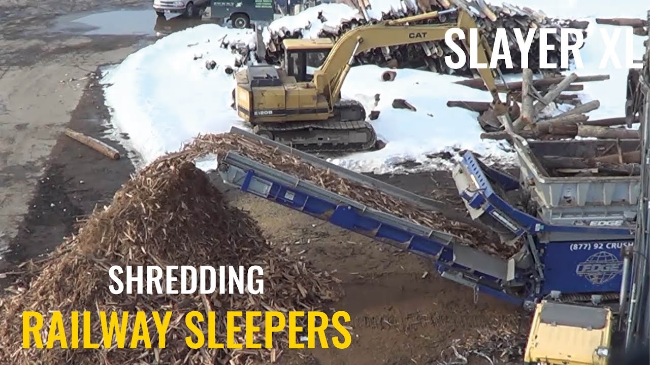 EDGE Innovate's Slow Speed Shredder processing Railway Sleepers