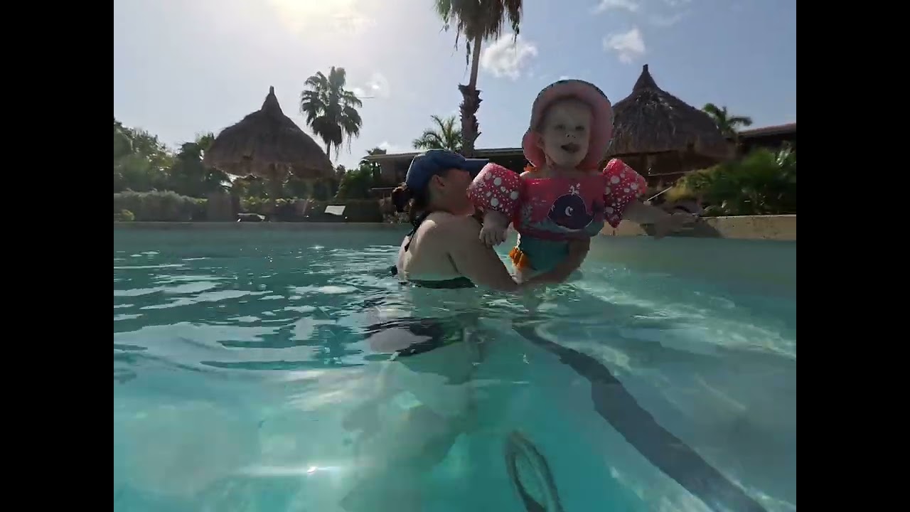 Aspen swimming in Curaçao at our AirBnB