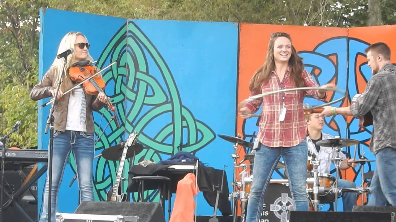 The Willis Clan and the Red Hot Chilli Pipers hula hoop at the 2015 Pittsburgh Irish Fest