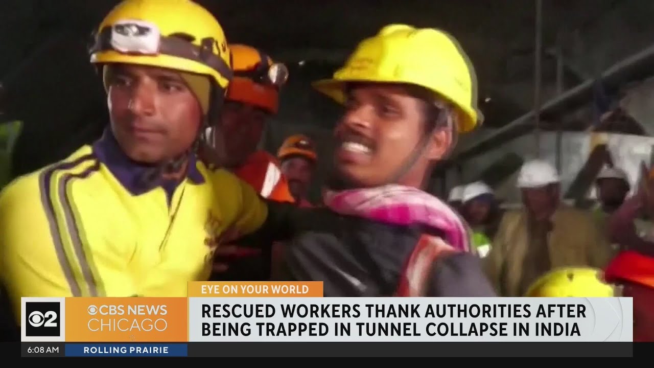 Workers rescued after being trapped in tunnel collapse in India.