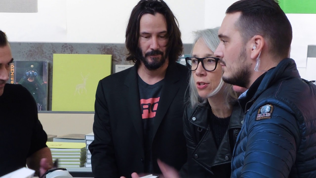 Keanu Reeves and Alexandra Grant, Sign their Book Shadows, in Paris.