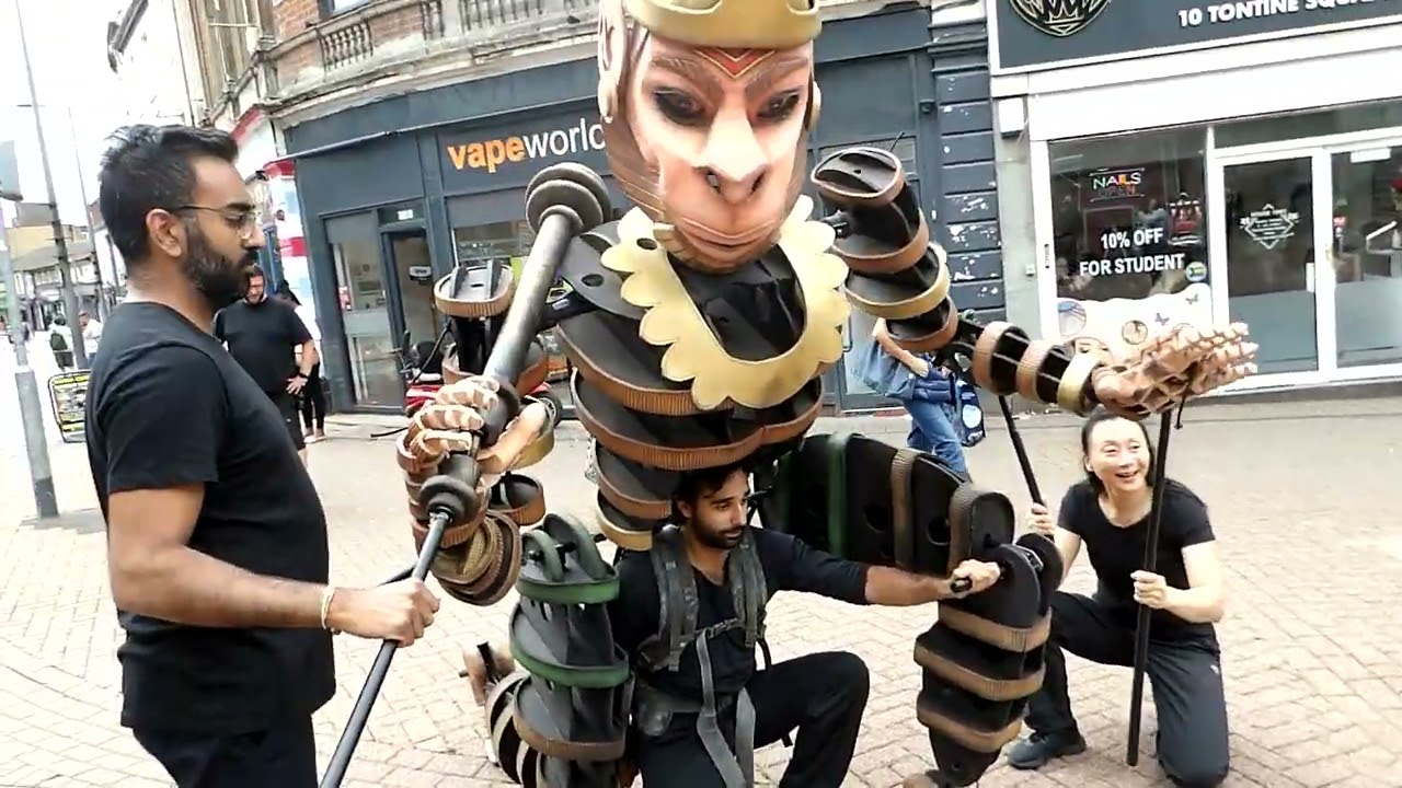 Giant Puppets walking through Hanley, Stoke-on-Trent