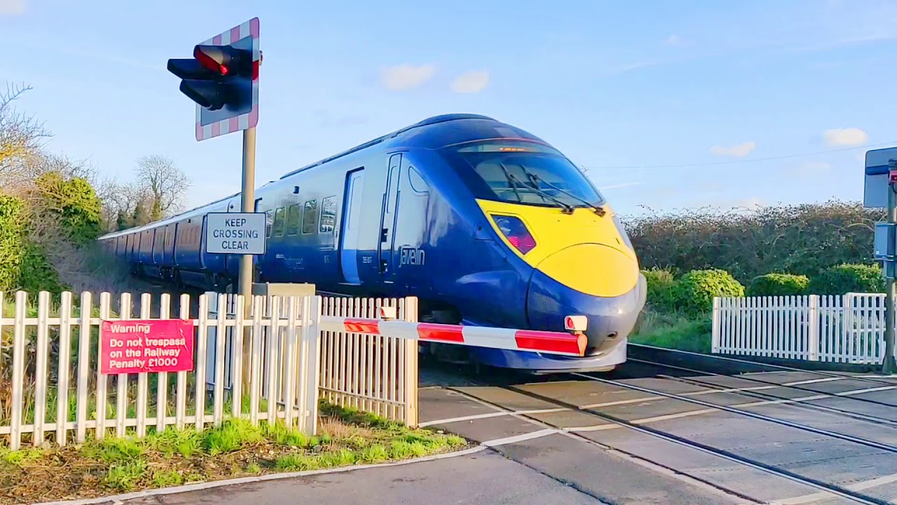 Two Trains at Sevenscore Level Crossing, Kent