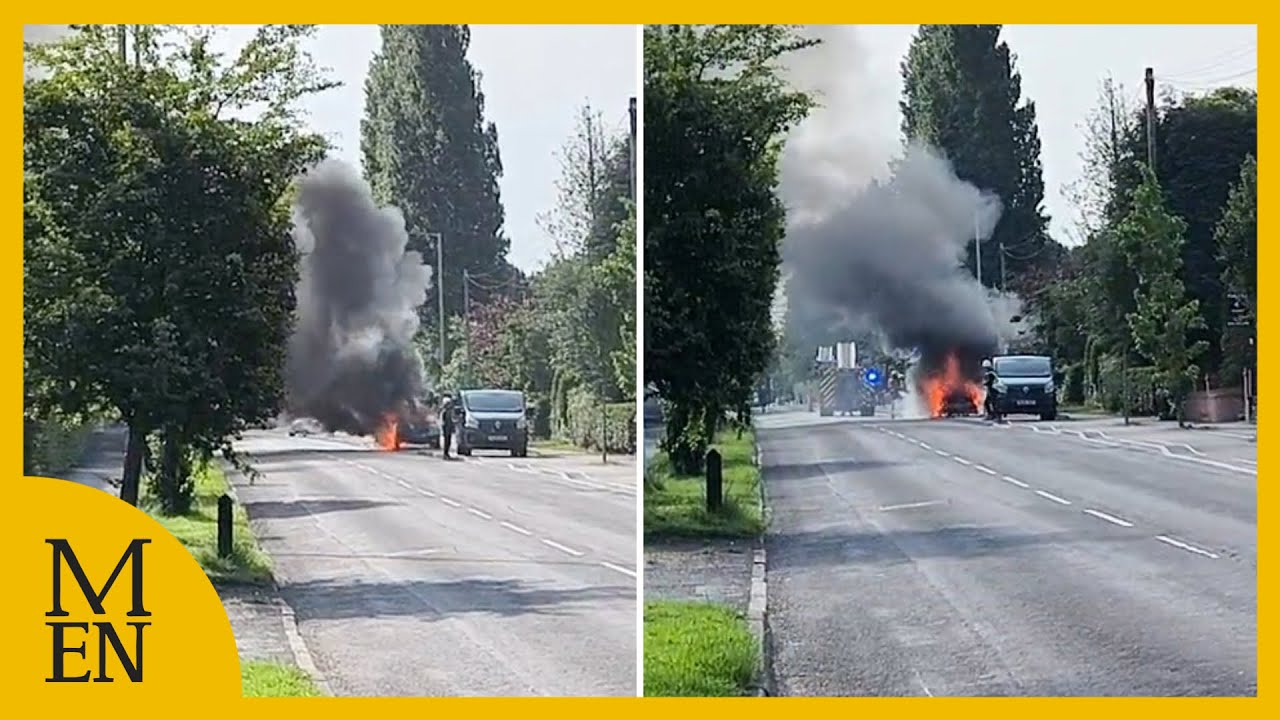 Flames soar as crew battles raging car fire outside Stockport school