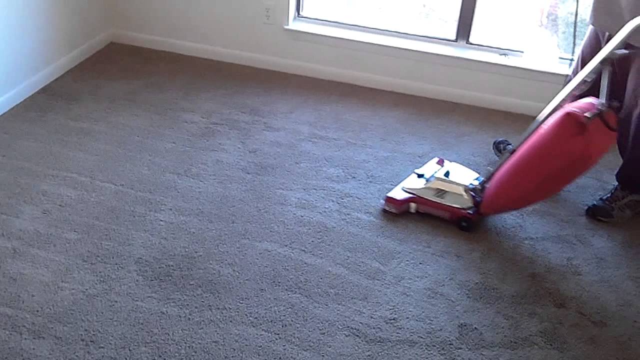 Sanitaire SC899F Vacuuming A Dirty Carpet