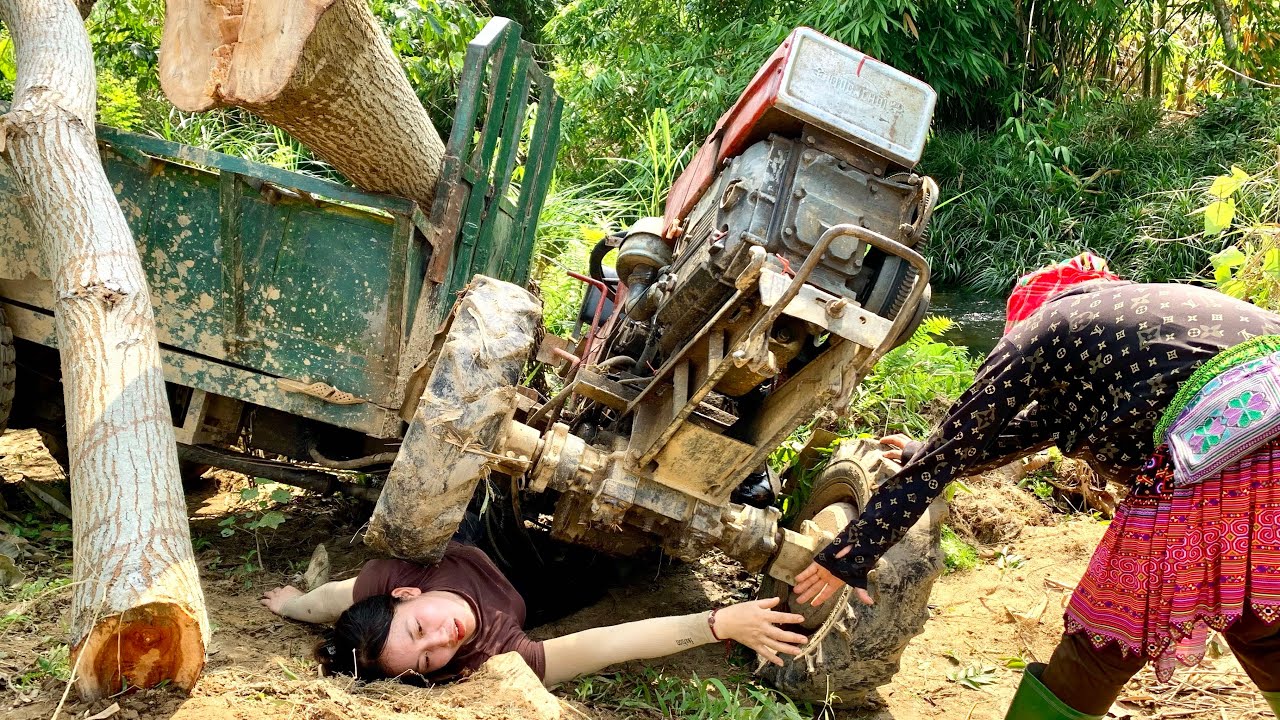 Agricultural vehicle carrying timber, a dangerous wheelie