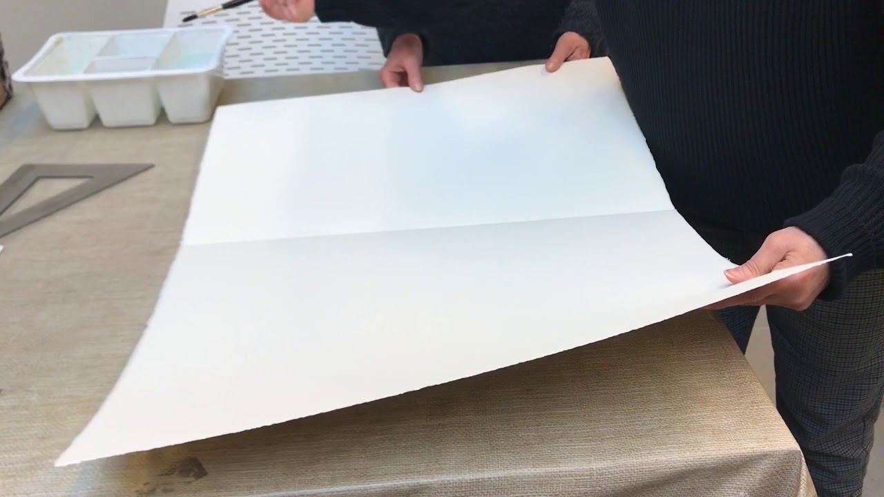 Tagliare la carta di acquerello a strappo