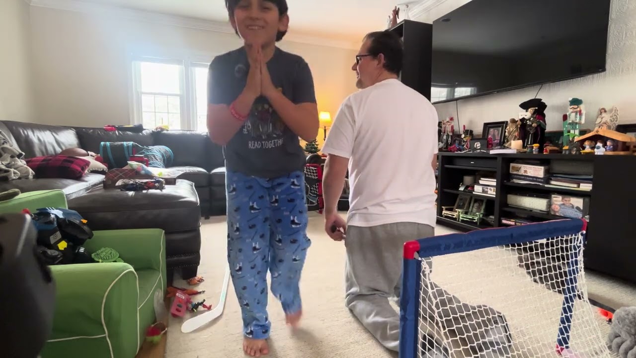Me and my dad play knee hockey