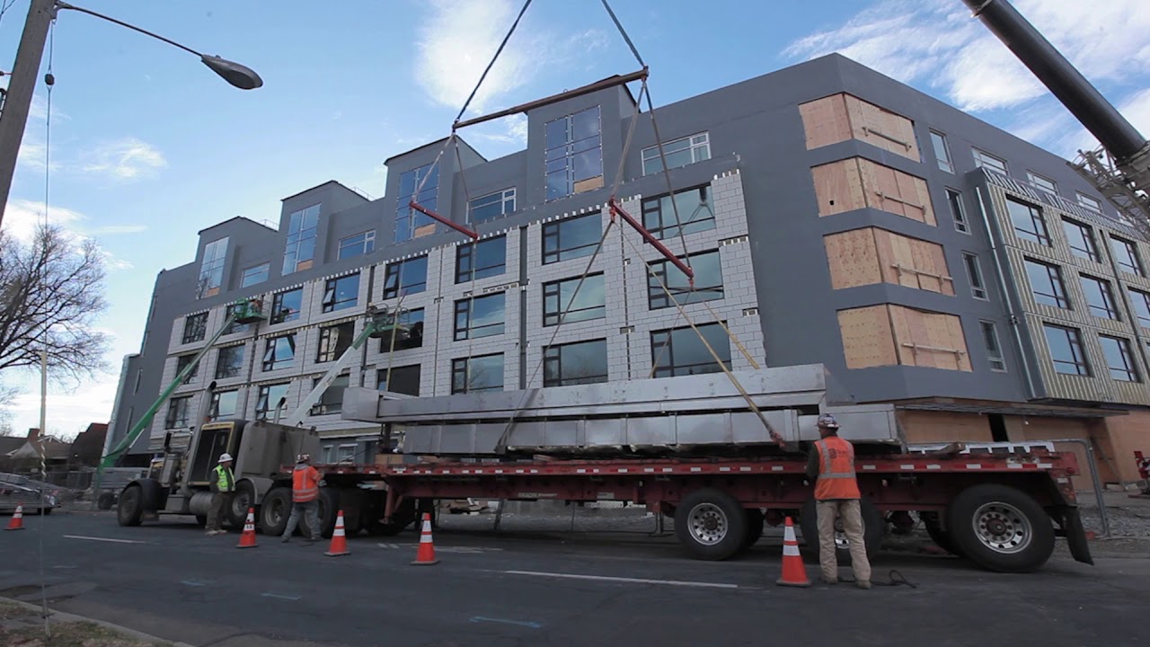 Custom Swimming Pool Gets Craned to Downtown Building Rooftop