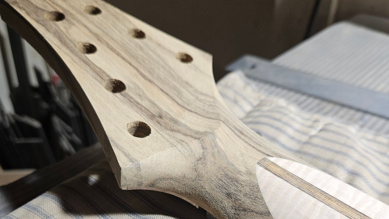 Reichardt Guitars is live! Carving a Volute!