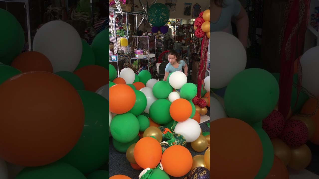 Popping Balloons from St. Patrick’s Day Arch