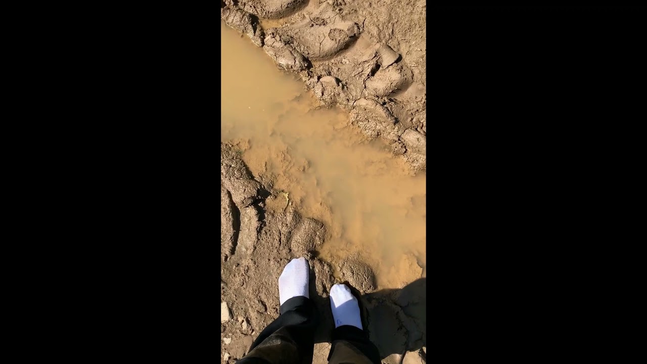 White socks and black trackpants muddy