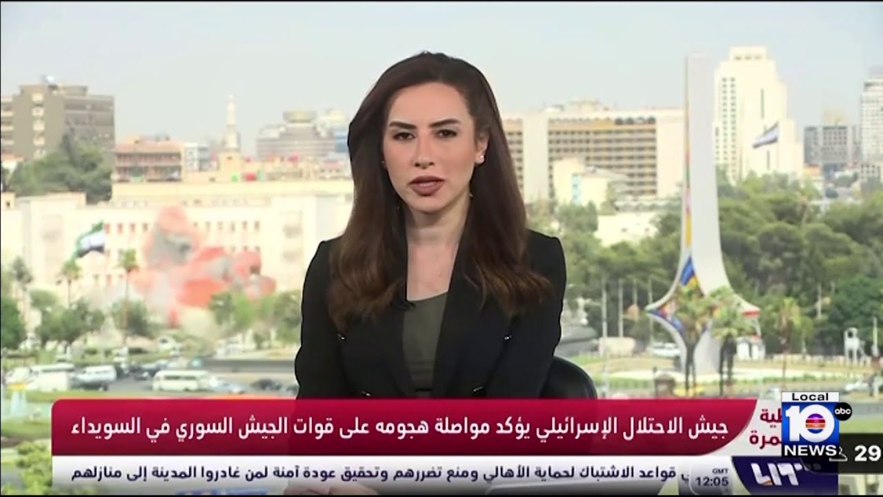 TV anchor takes cover during Israel's attack in Syria