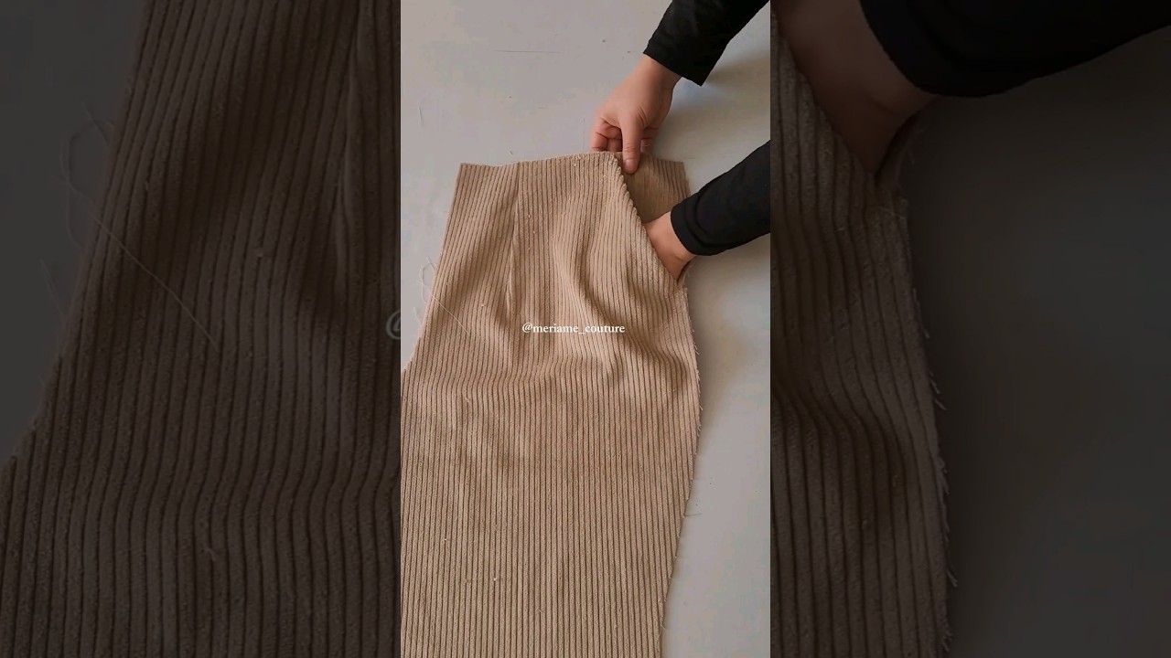 Couture de la poche d'un pantalon.