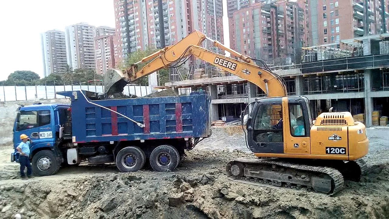 Tutorial como cargar volqueta con excavadora. Cómo cargar de la forma adecuada