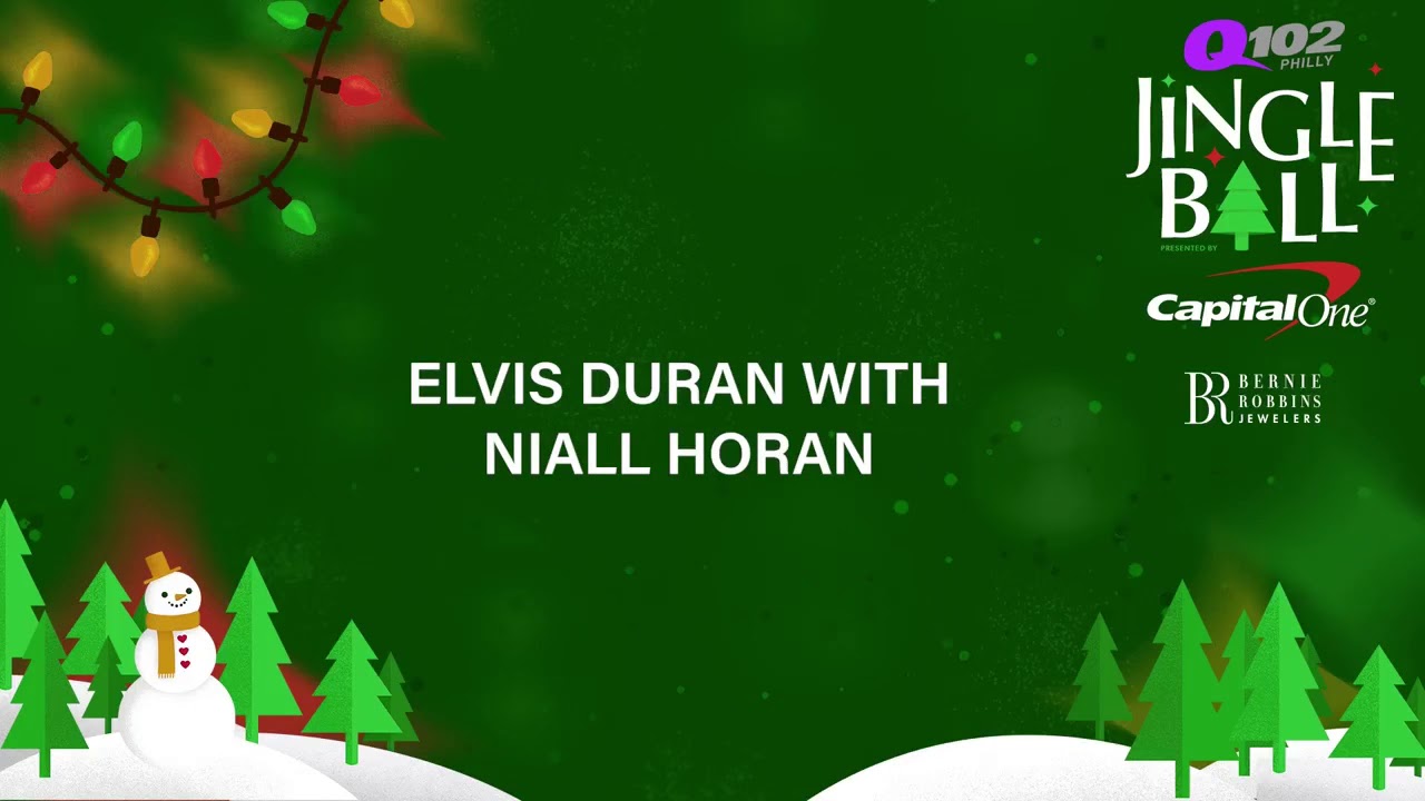 Elvis Duran talks with Niall Horan at the Q102 Jingle Ball