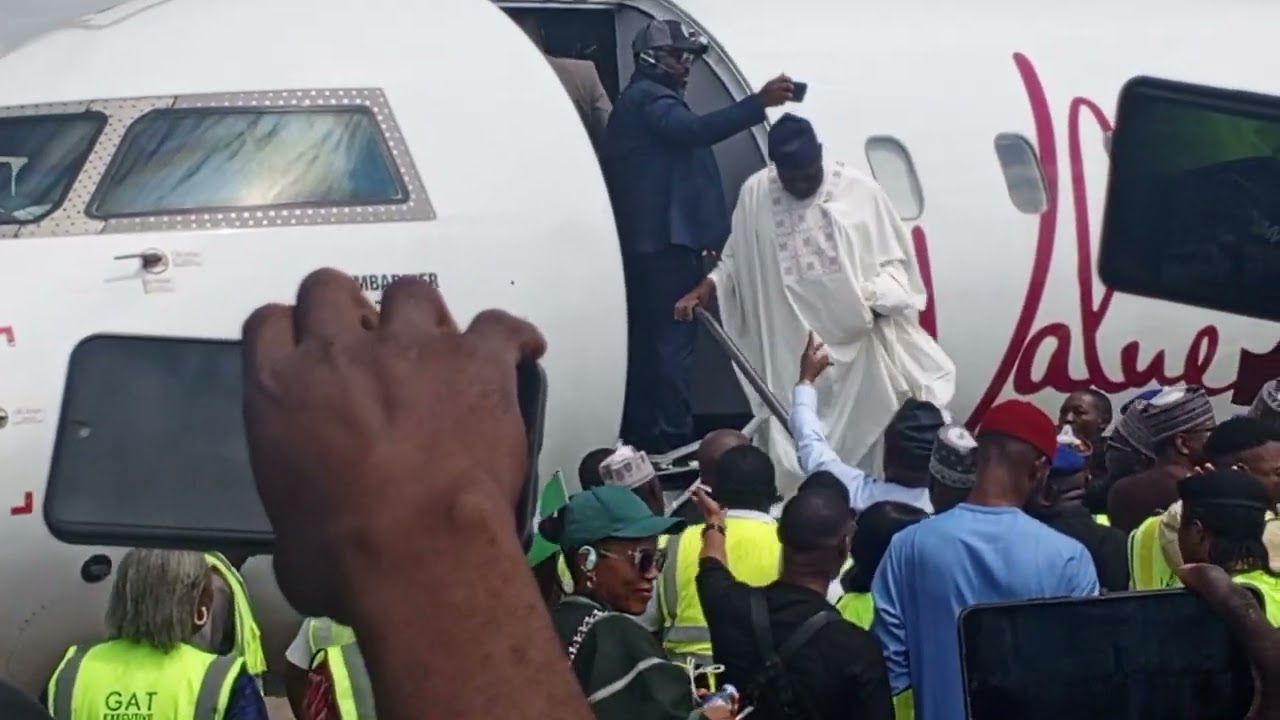 The super Falcons of Nigeria returned with the trophy in Abuja international airport today 